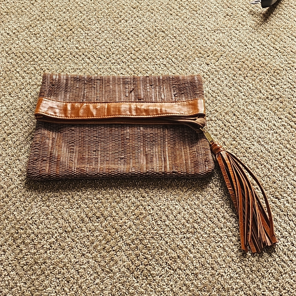Brave ladies woven leather clutch.  Excellent condition.